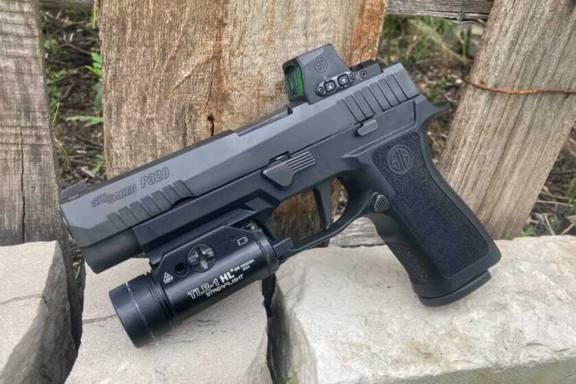 Sig Sauer P320XF BXR3 sitting on rocks
