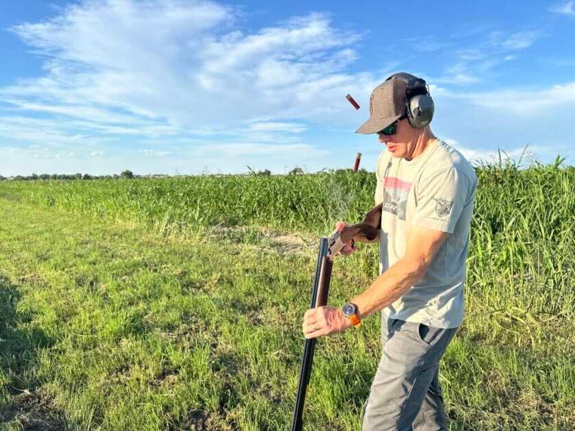 man shooting Citori 725