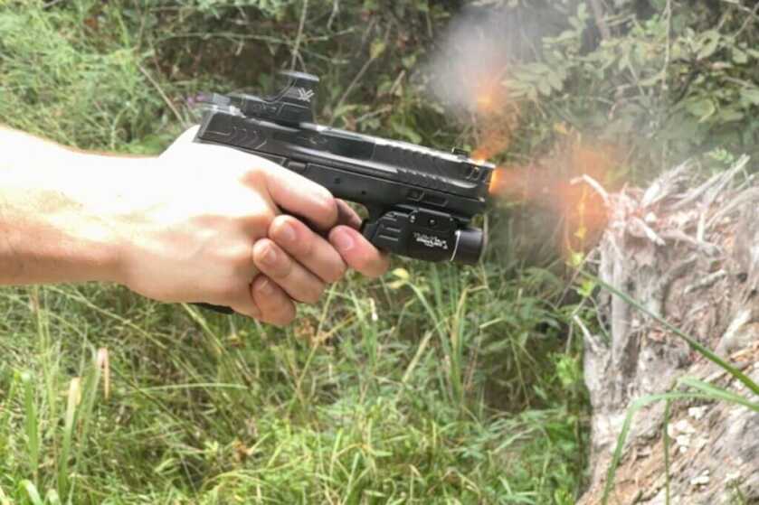 Competition pistol firing 