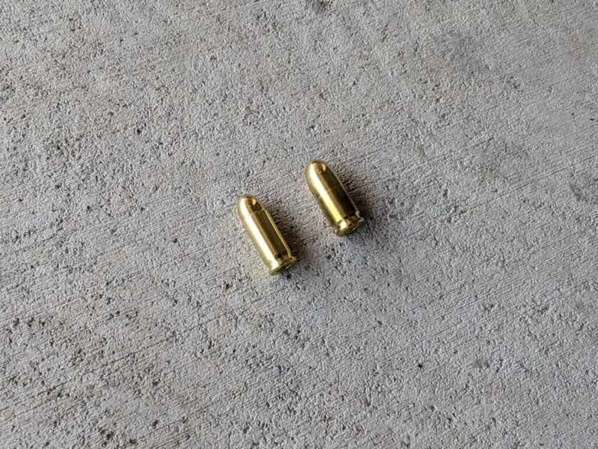 two gold-colored bullets