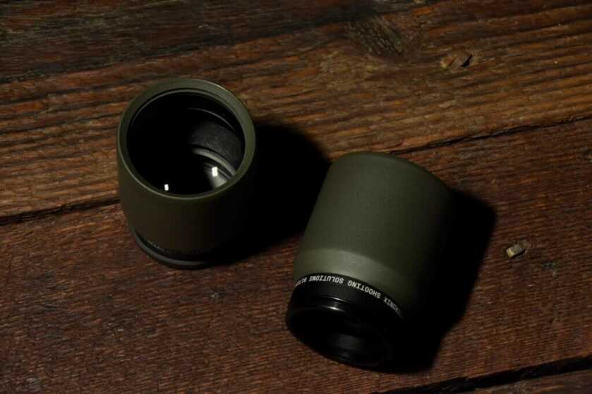 Range enhancers staged on wooden background.