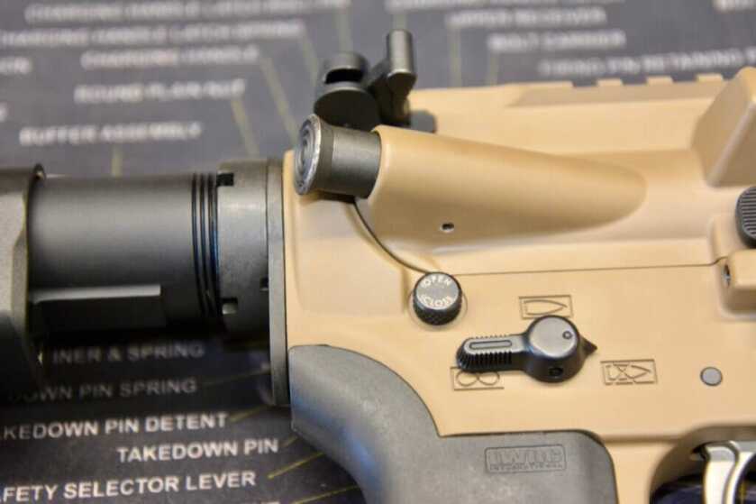 Rifle with Juggernaut Tactical Hellfighter Pin Assembly