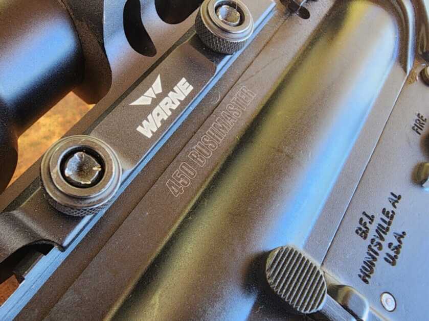 Warne scope mount on Bushmaster 450 BM SD for reliable optic hold under heavy recoil