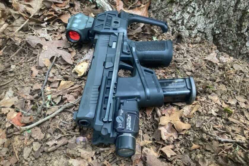 TLR-7 HL-X mounted to Raider on leaves in forest