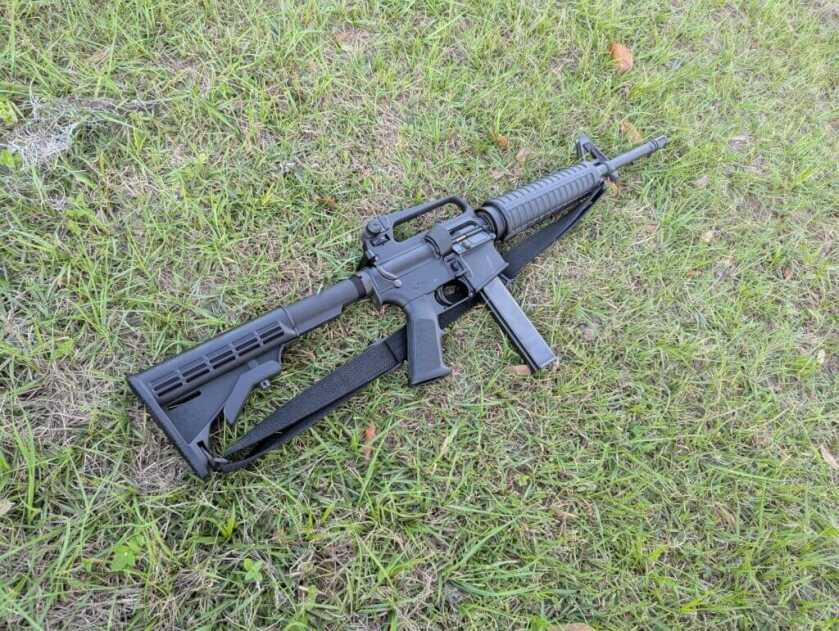 retro LAR-9 AR rifle on grass
