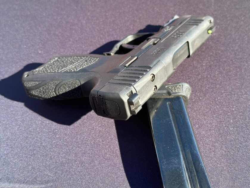 Closeup view of the back of the handgun, focusing on the rear of the slide.