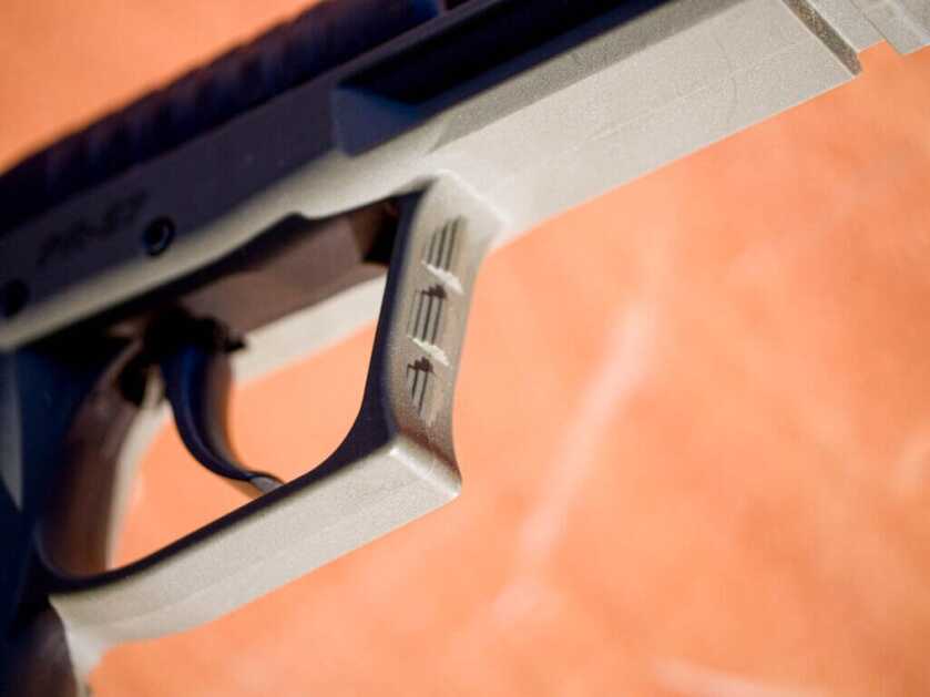 Closeup of the front of the trigger guard showing the texture.