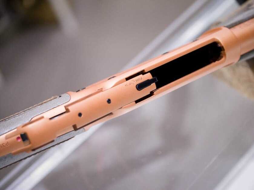 The top of the action with the action open facing right,.