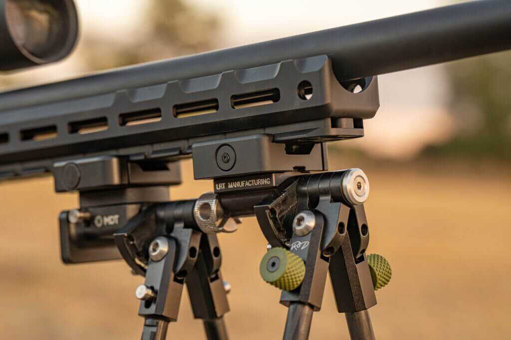 Two bipods mounted to rifle