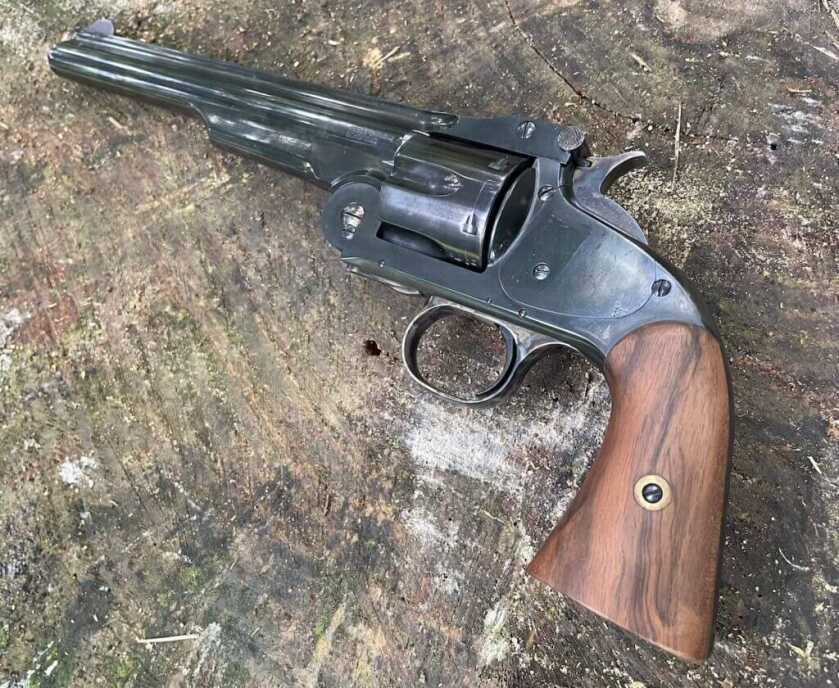 Left side view of Cimarron Model No. 3 1st Model American revolver with wood grips