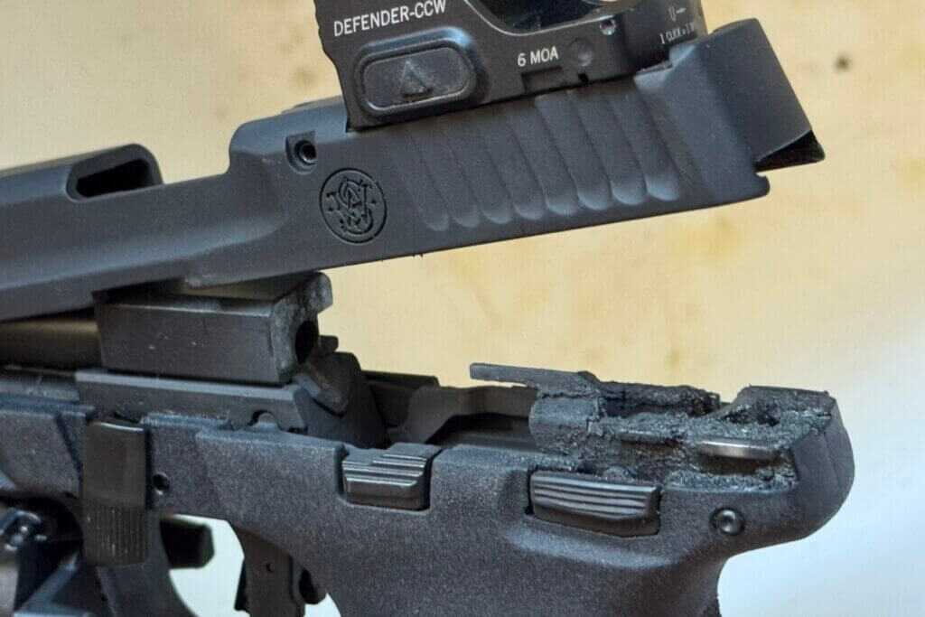 Closeup showing carbon and fouling buildup on M&P22X after 250 suppressed rounds