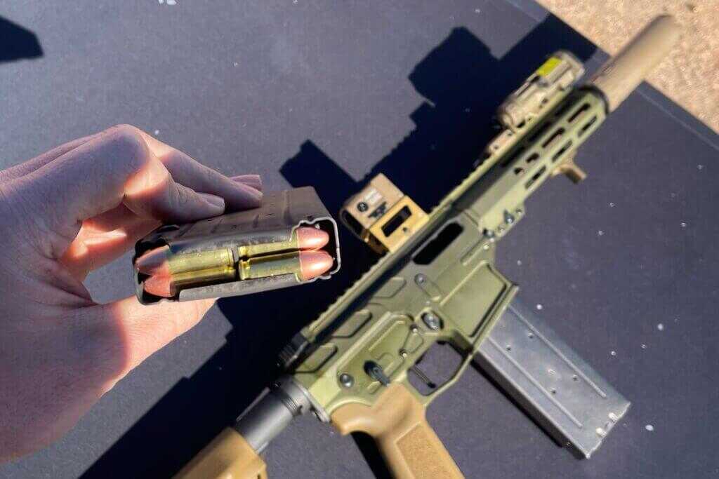 Mimic speed 9 on table with loaded magazine