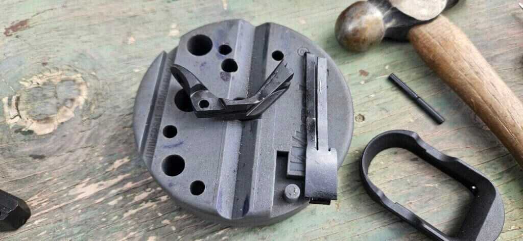 Deactivated grip safety and replaceable sear spring on the EAA Witness2311 CMXX