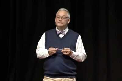 Finger trap metaphor representing tension between gun rights and gun control debate