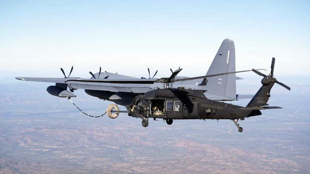 Lockheed Martin MC-130J Commando II refueling an MH-60 Black Hawk during special operations support