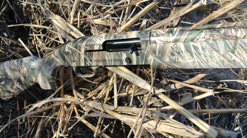 Mossberg 930 Duck Commander shotgun in Max-5 camo in a duck blind