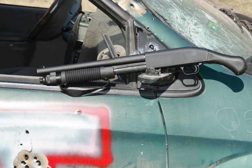 Mossberg 590 Shockwave 14 inch non-NFA 12 gauge firearm