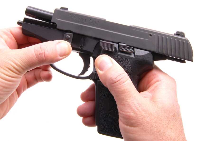 SIG Sauer P239 single stack DA/SA carry pistol field stripped