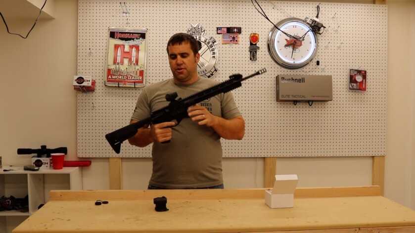 Aimpoint CompM5 red dot on an AR-15 rifle 2026