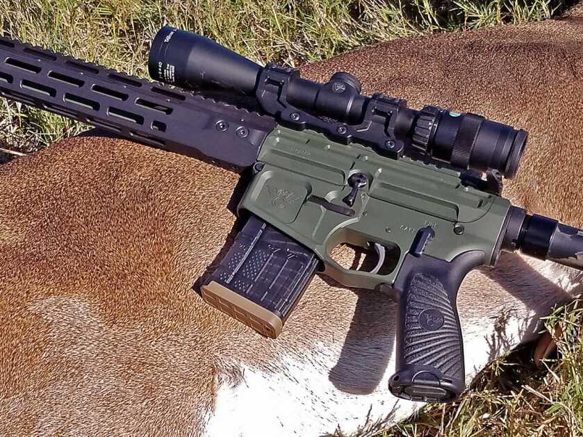 Wilson Combat Ultralight Hunter 300 HAM'R AR-15 resting on a harvested whitetail deer