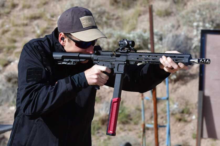 JP Enterprises JP5 roller-delayed 9mm competition carbine with red dot sights