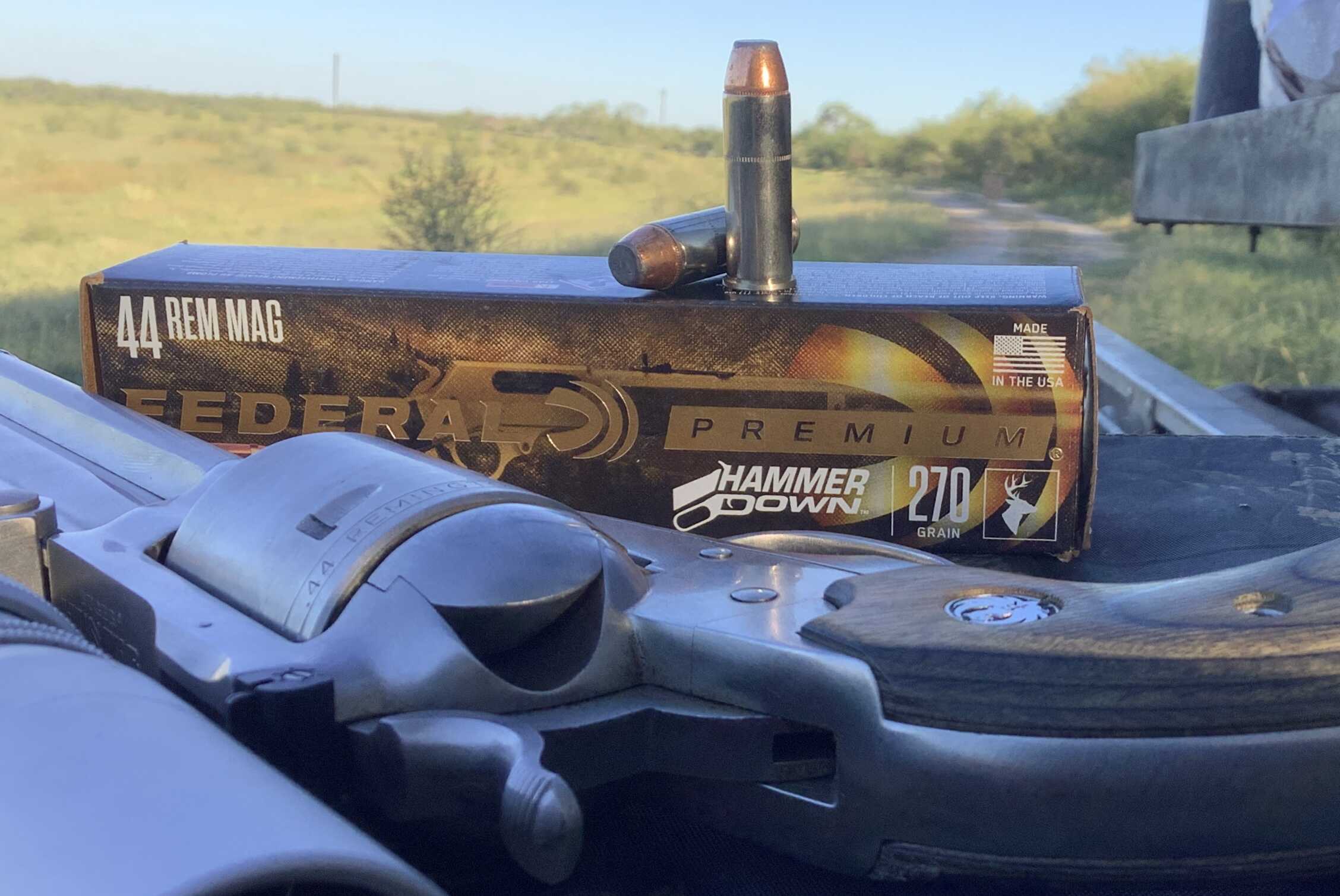 Box of Federal HammerDown 270 grain .44 Magnum ammunition with a cartridge resting on a revolver