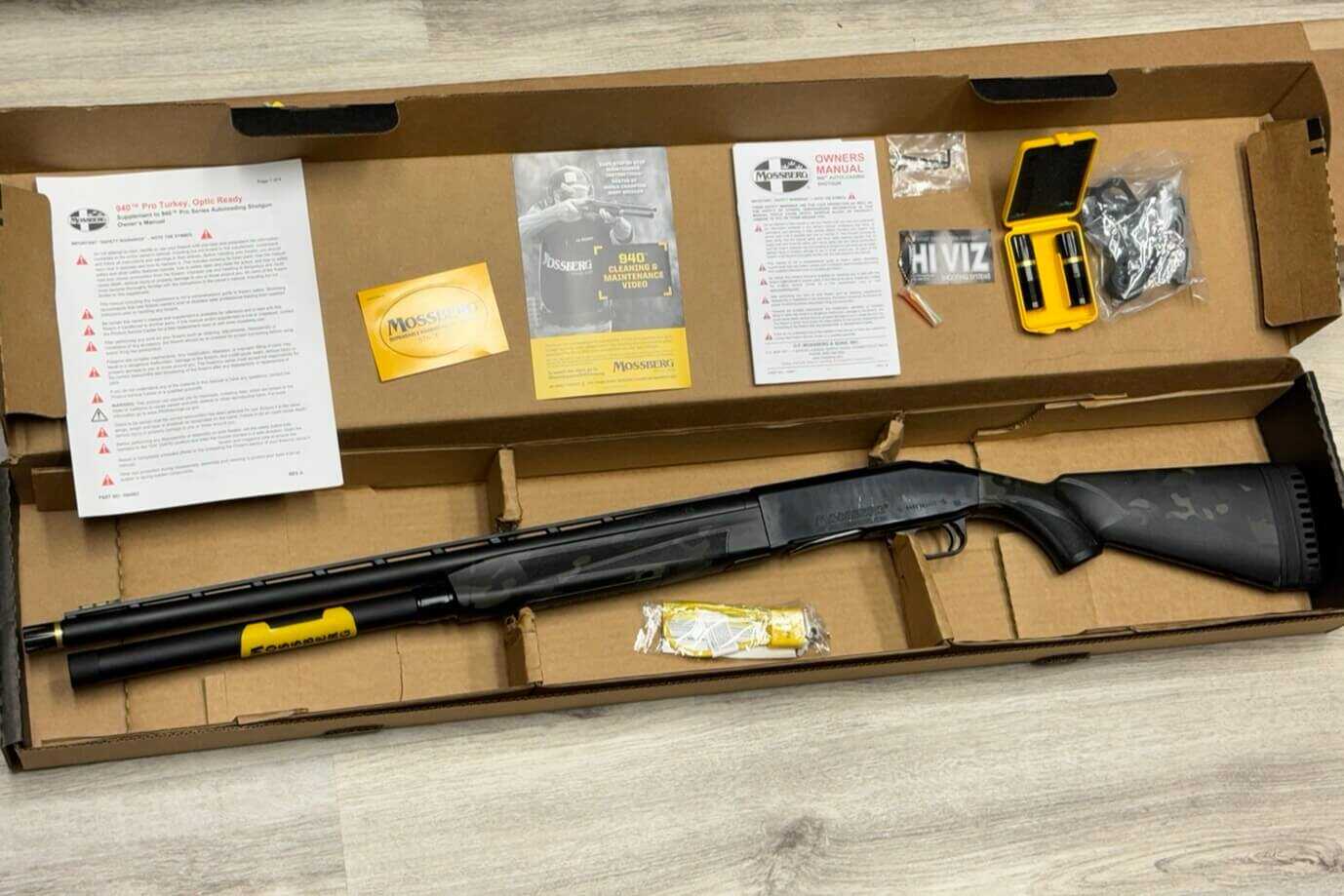 Mossberg 940 JM Pro competition shotgun with included accessories