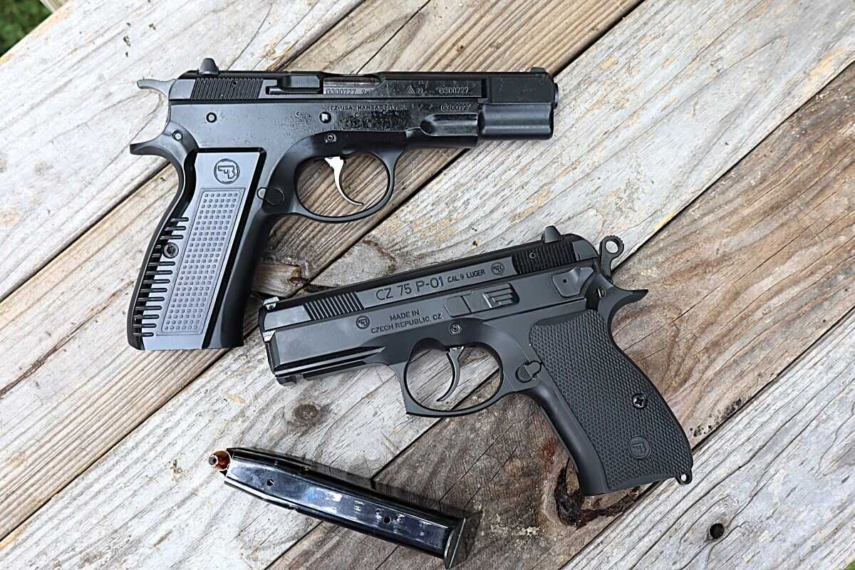 CZ 75 B full-size 9mm pistol with a CZ P01 compact pistol on a wooden table