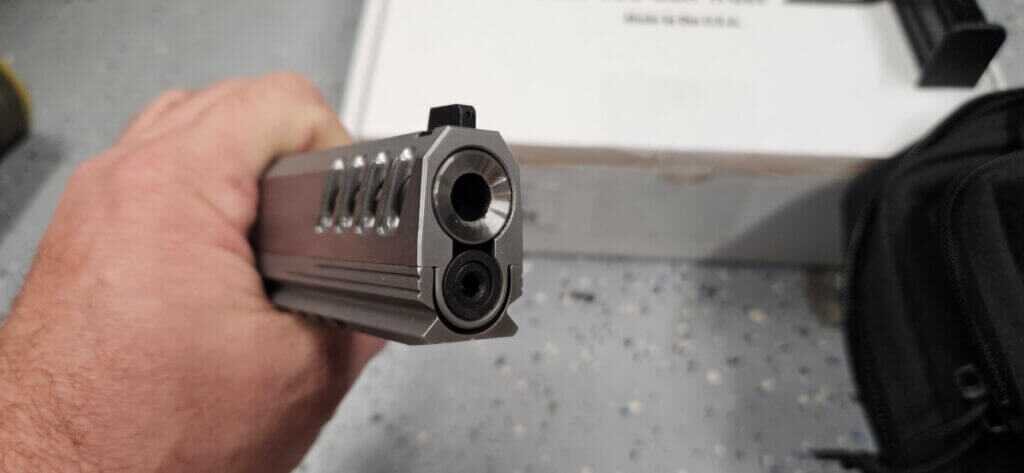 Front end of Bersa M2XI 9mm 2011 showing bull barrel crown and tri top slide profile