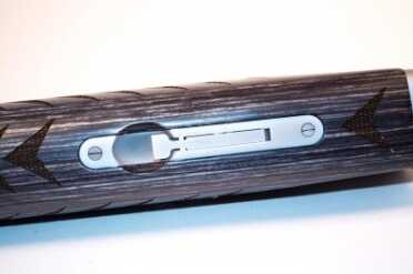 Wood to metal fit is as good as you'll find on a production gun.