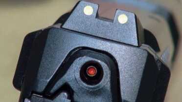 H&K VP40 Review– Great Pistol with More Punch VP40 as tested included the base model 3-dot sights without Tritium. The 'cocked striker indicator' is a highly visible red dot. Also on the VP40 are the cocking assist 'ears' or tabs on the rear of the slide. The author actually finds these quite useful.