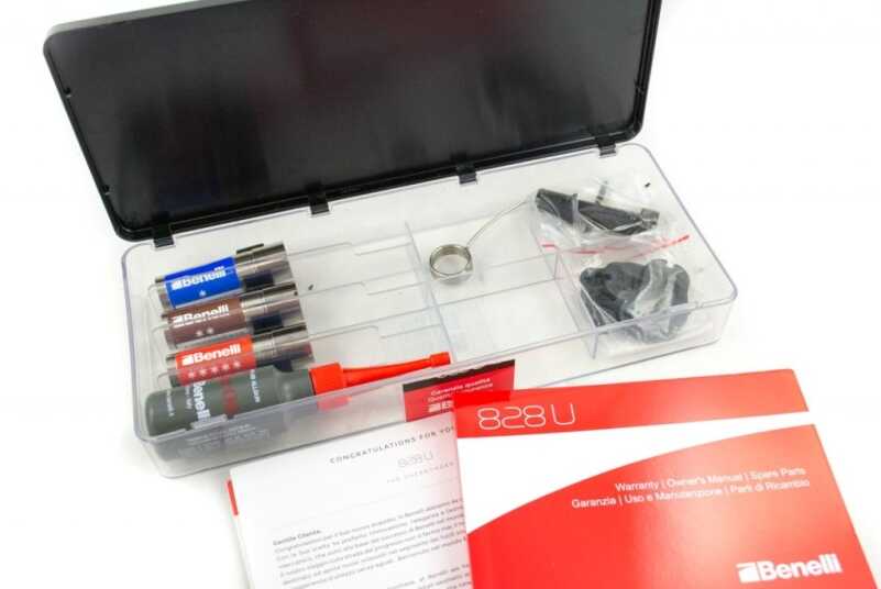 Benelli 828U--The Future of the Over-Under Shotgun The plastic box inside of the hard case includes extra choke tubes, gun oil, choke wrench, shims and documentation.