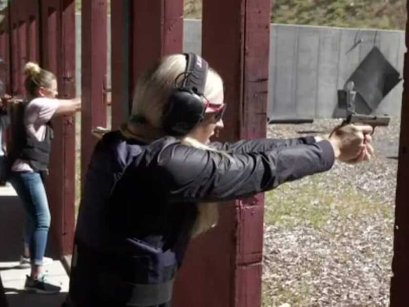 Beginner shooter practicing a firearm training drill during the Utah County Sheriff's Teachers Academy