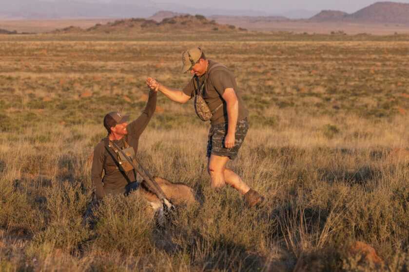 Hunters in field