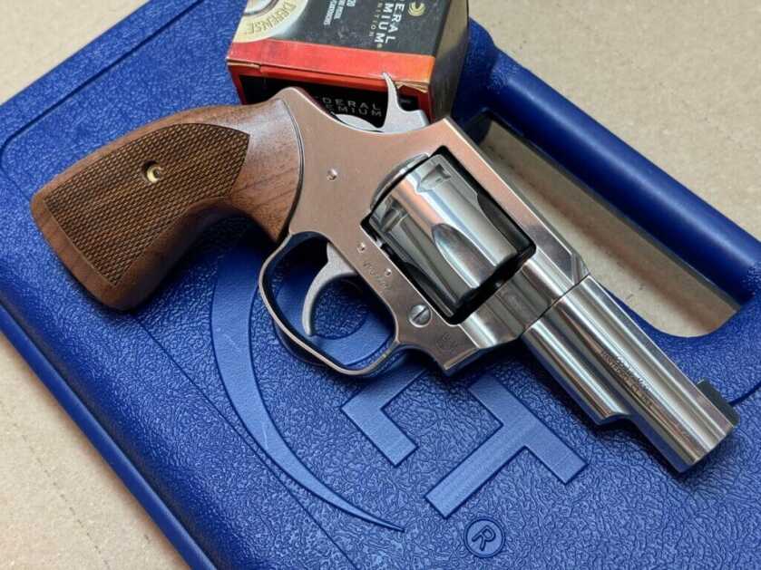 Colt Viper revolver on blue carry case with box of Federal Punch ammo