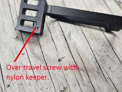 Double stack with over travel screw and nylon keeper.