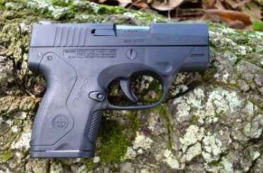 All the takedown controls are flush on the right side—the Striker Deactivation Button and Disassembly Pin. Note the reversible magazine release button that makes the Nano fully ambidextrous.