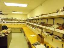 Bond Arms Derringer - Range Report & Factory Tour : Each box contains a different model of holsters, sometimes two. This is about half of their holster fulfillment room.