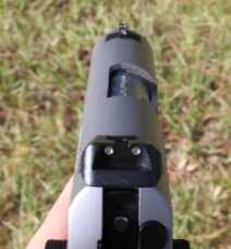 The gun comes with Trijicon tritium inserts in a Novak style low profile carry sight. These inserts glow in the dark without needing to be “charged up” by a light source.