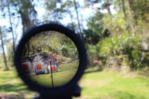 The Trijicon Accupoint has a single glowing triangle reticle that is super fast.
