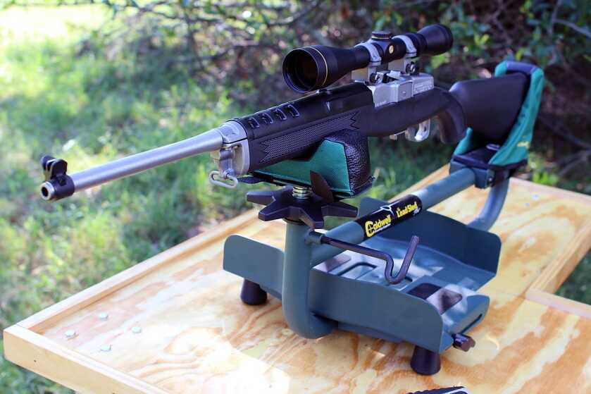 Ruger Mini Thirty rifle with scope on a shooting rest