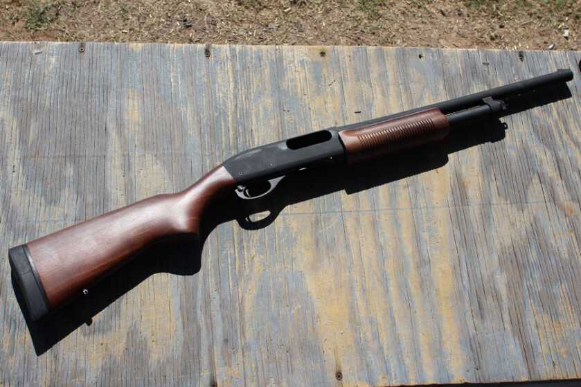 Remington 870 Police Magnum pump shotgun with walnut stock, best police trade-in shotgun 2026