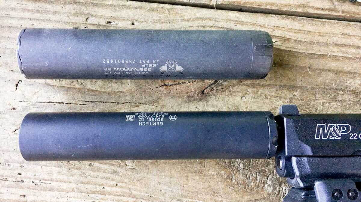 SilencerCo Sparrow stainless .22 suppressor beside a Gemtech GM-22, best stainless .22 suppressor 2026