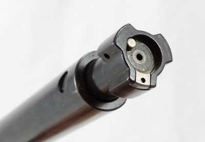 The bolt locks with three large lugs.