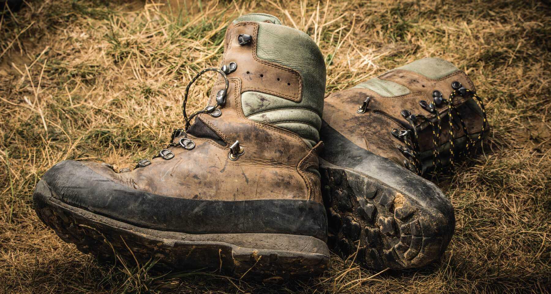 Worn Kenetrek Mountain Extreme hunting boots in the grass, best insulated mountain boot 2026