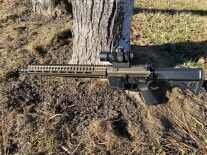 AR-15 with a CMMG Mk57 5.7x28mm upper and red dot