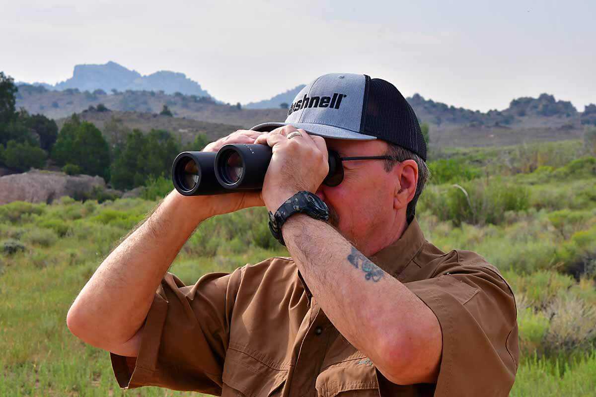 Hunter glassing with Bushnell Fusion X 10x42 rangefinder binoculars, best budget pick 2026