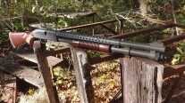 Mossberg 590A1 Retrograde trench style shotgun with wood stock