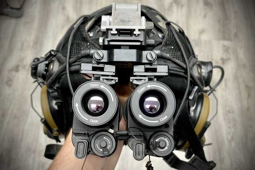 Two iRay MH25 thermal monoculars mounted on a tactical helmet