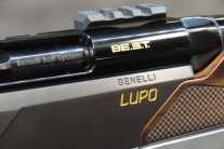 A beautiful, shiny rifle with a satin walnut wood stock and aluminum bedding block.